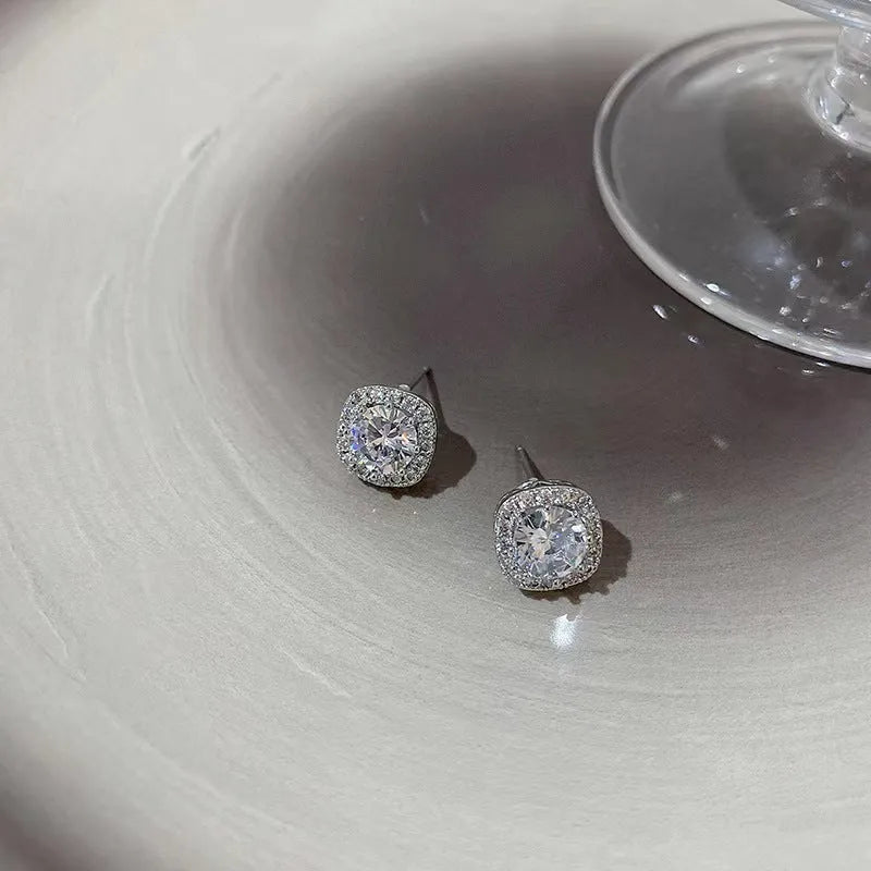 Square geometric diamond earrings for women in silver or gold colour on an alloy base.