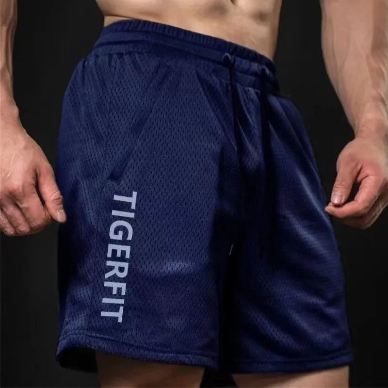 Men's loose-fit light grey mesh sport shorts with straight cut and no logo on a plain background.