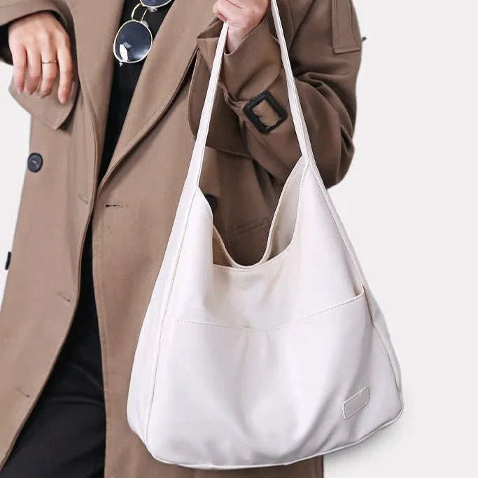 Women's soft PU leather shoulder bag in retro style with dimensions 32x12x25cm
