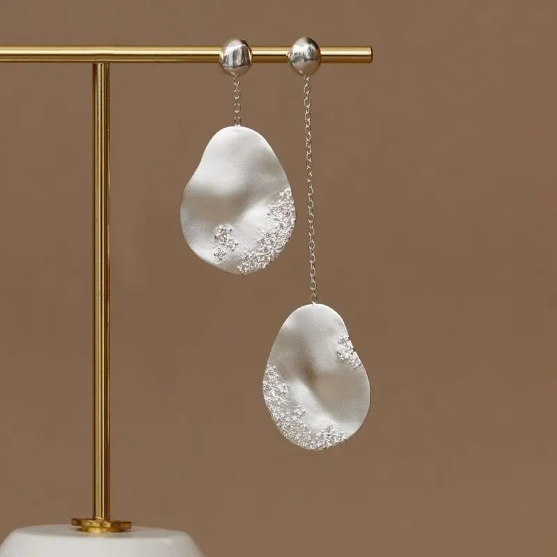 Asymmetric floral earrings with Chinese style design featuring zircon mosaic accents on gold-plated materials
