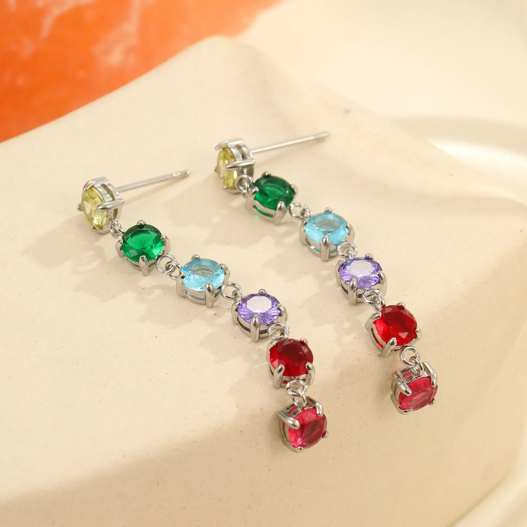 Gold-finish stainless steel earrings with inlaid colour zircon in geometric round and diamond pattern