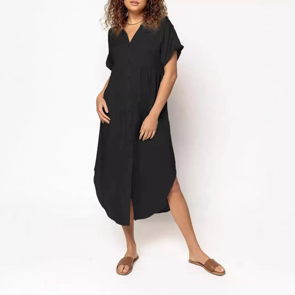 Loose-fitting casual midi dress with buttons down the front, shown in a solid colour.