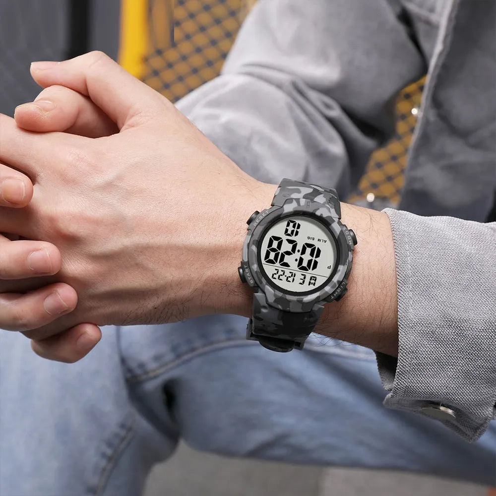 Multi functional waterproof male student sports electronic watch with black plastic band and round digital dial