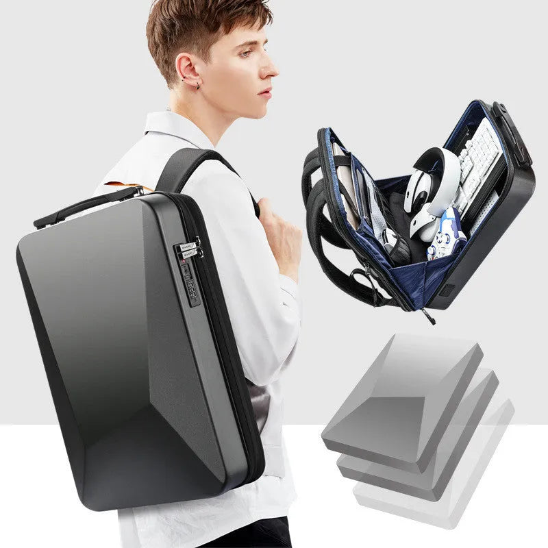 Men's hard shell gaming backpack in black or silver with anti-theft lock and multiple internal pockets.