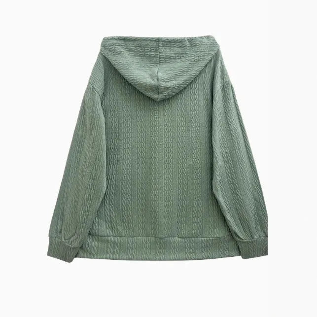 Green women's loose fit hooded sweater with full-length front zipper, long sleeves, and a casual style.