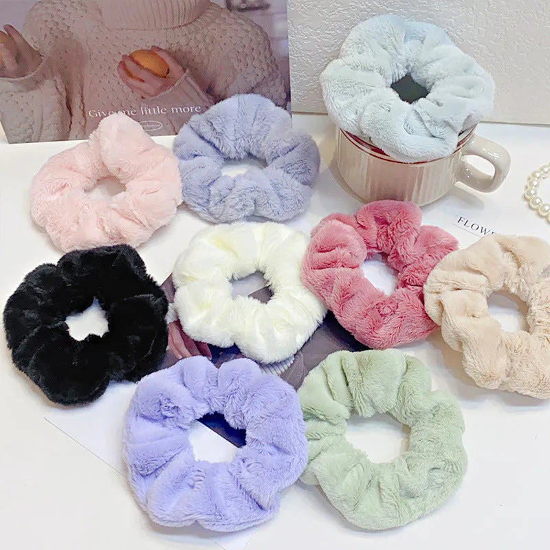 Fashion simple solid colour cloth hair ring for women in round ring loose style, available in 12 colours.
