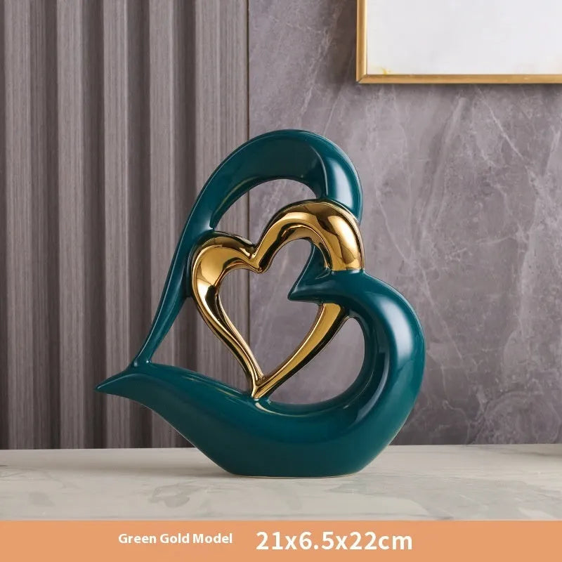Modern white porcelain heart ornament on display in a choice of eight metallic and coloured finishes.