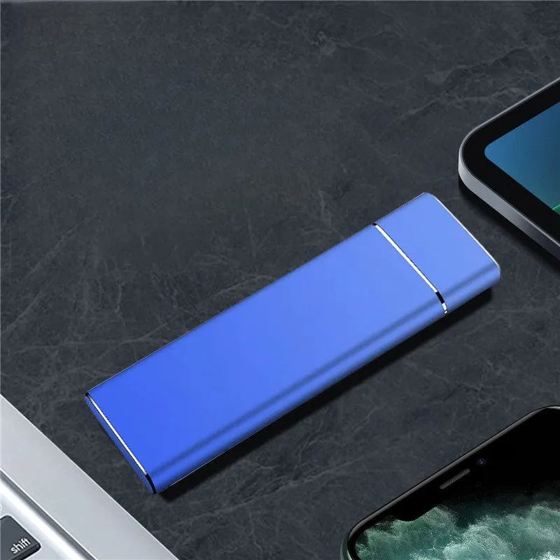Sapphire blue portable solid state hard drive with metal casing showing compact dimensions