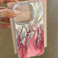 Colourful flame pattern silicone phone case for Apple iPhone, showing blue and red design variations.