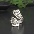 Silver adjustable retro ring with minimalist design on adjustable opening