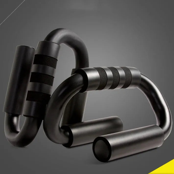 Black S shape push-up bracket rack measuring 20x12x13cm on a flat surface for home exercise