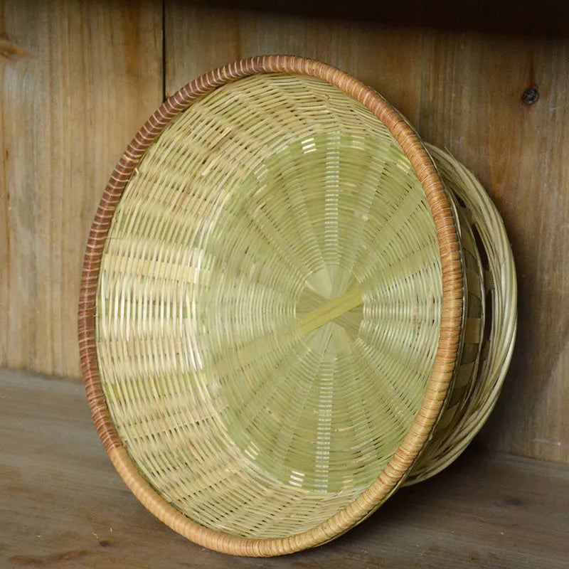 Handmade woven bamboo storage basket showing traditional craftsmanship and three size variations