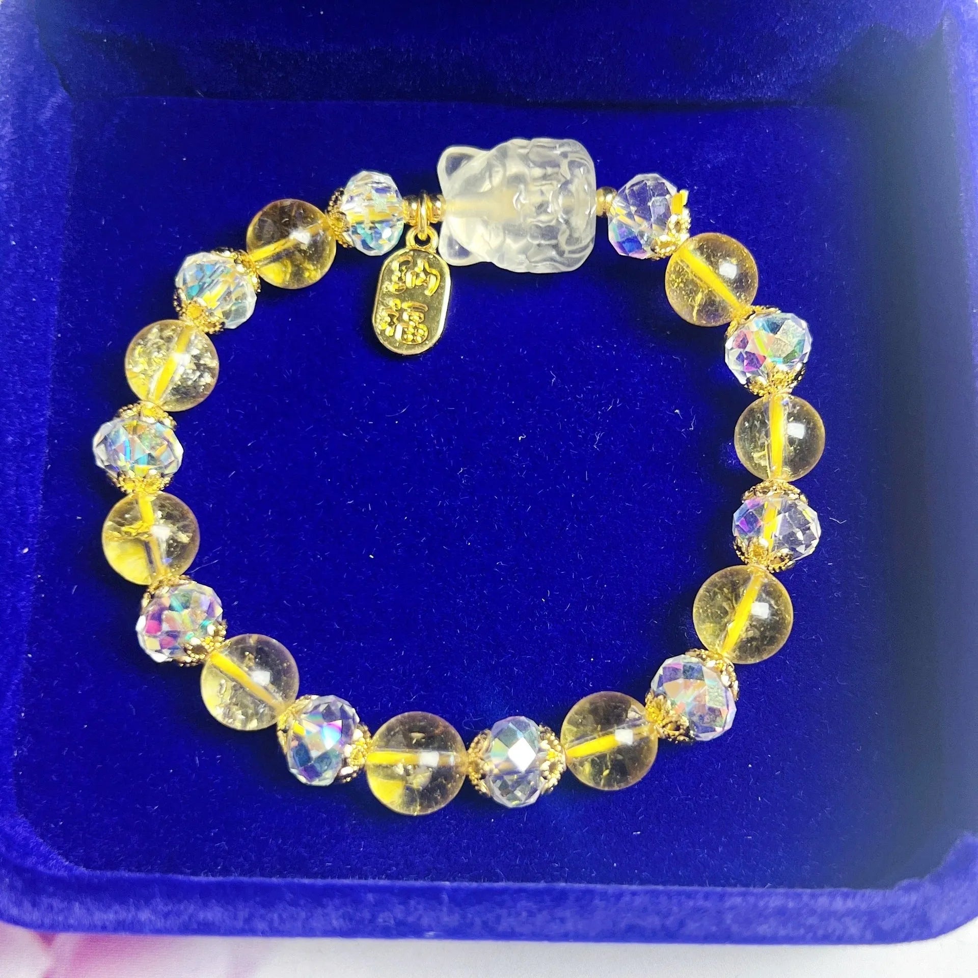 Handmade citrine crystal bracelet with a detailed nine-tail fox charm on a gold-toned chain.
