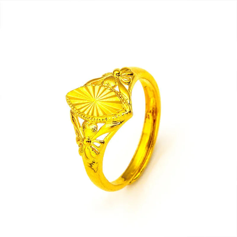 Gold electroplated brass ring with geometric open diamond flower design