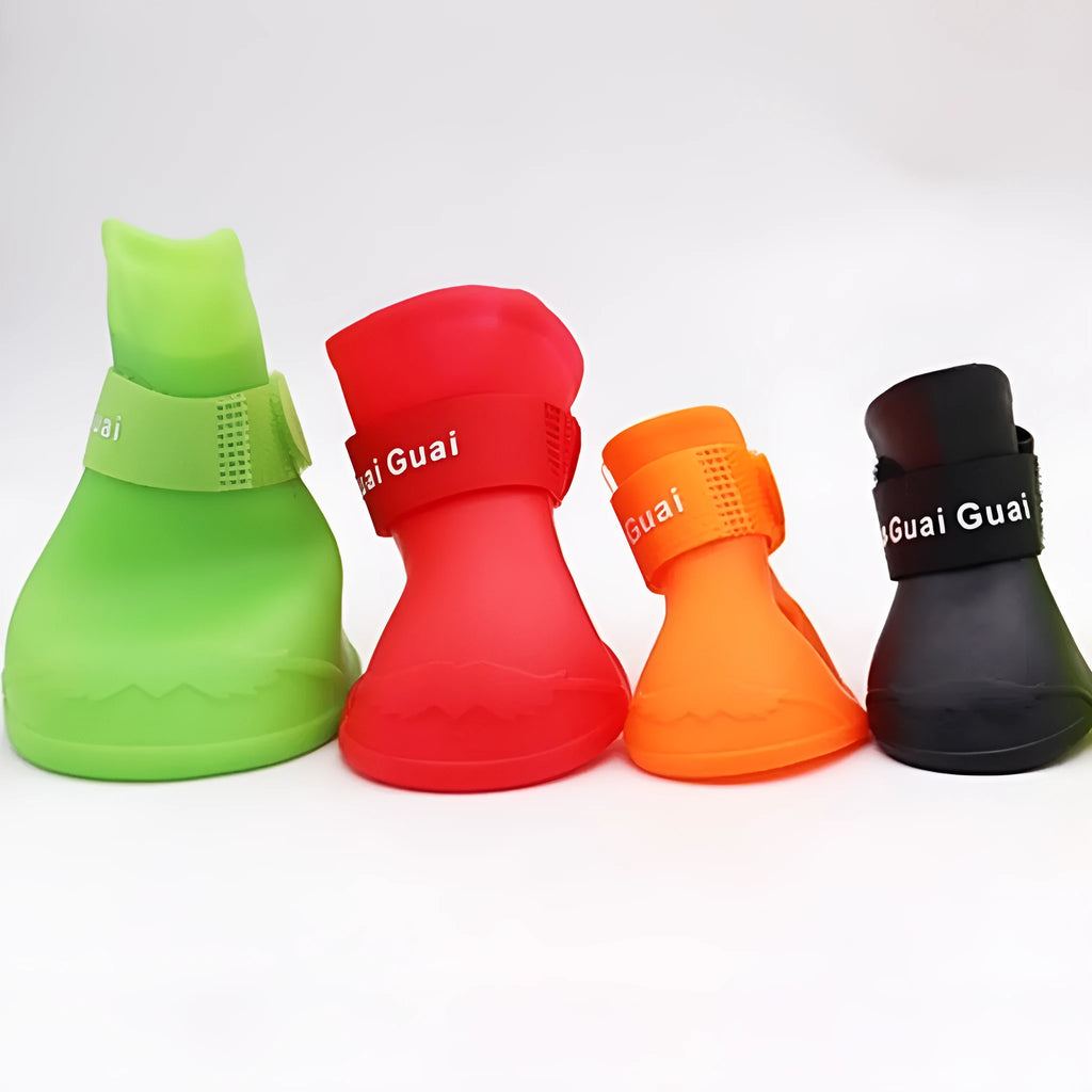 Rubber pet rain shoes in multiple colours with soft-soled anti-slip design for waterproof paw protection
