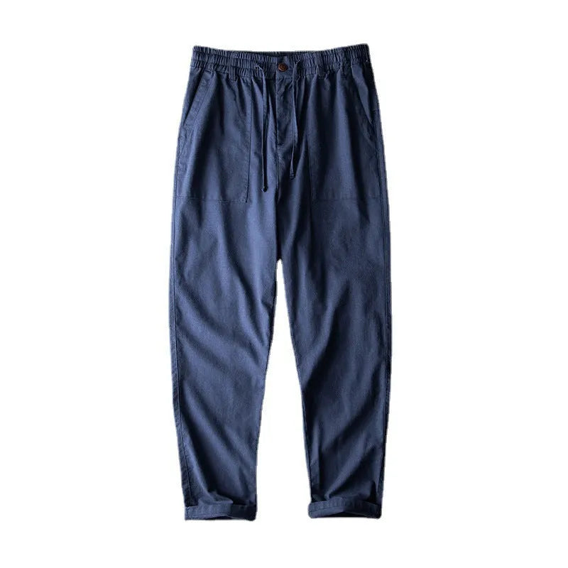 Men's linen casual trousers in solid colours with mid waist design for leisure wear