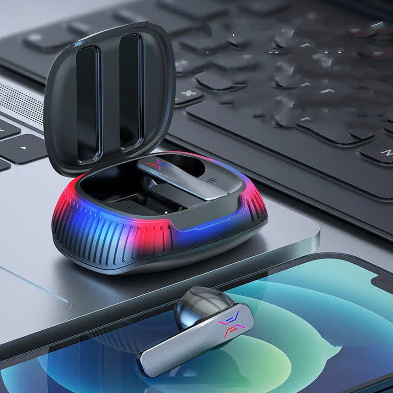 Hall Flashing wireless gaming earplug headset in black or white with USB Type-C charging cable.