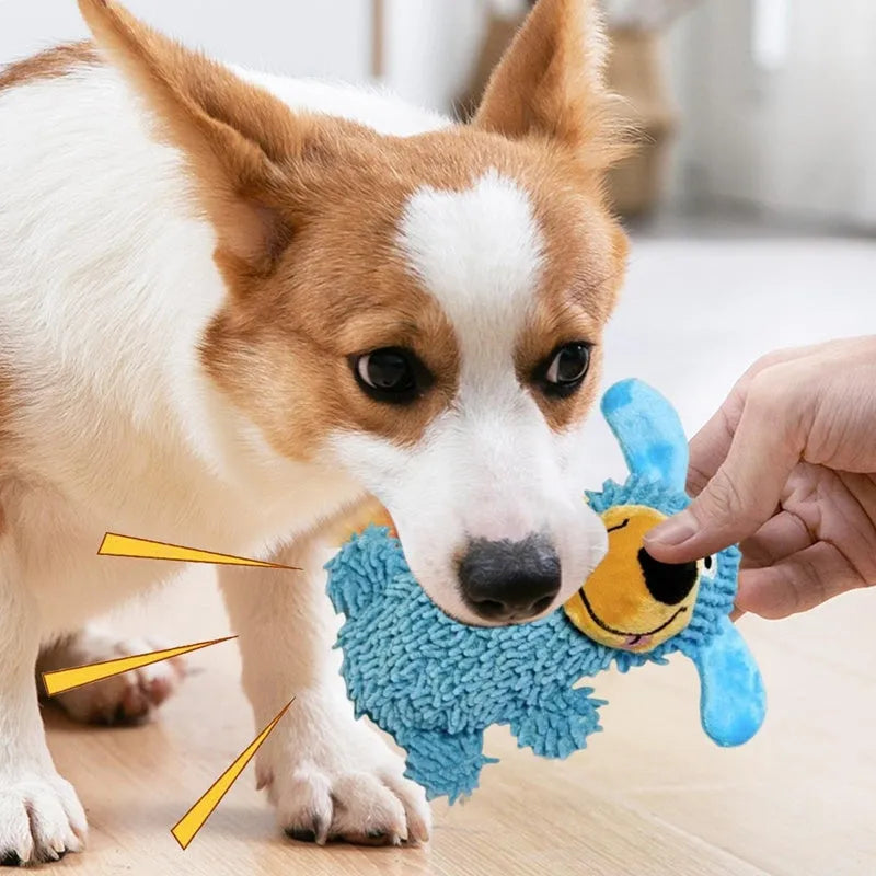 Squeaky plush dog toy in blue with cheerful dog shape and built-in squeaker