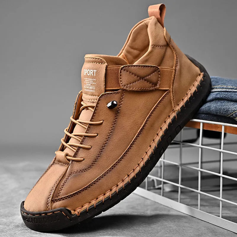 Men's mid-top Martin boots in khaki with tooling stitching and an elastic band ankle