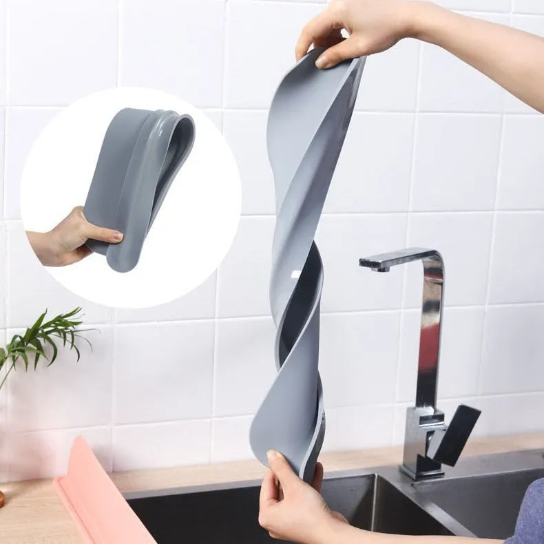 Thick silicone kitchen sink water blocking plate splash guard in grey colour showing 52mm width and 85mm length