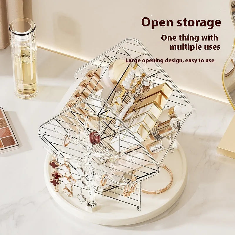 Clear plastic rotating makeup storage box organiser with 360-degree spin base on a dressing table.