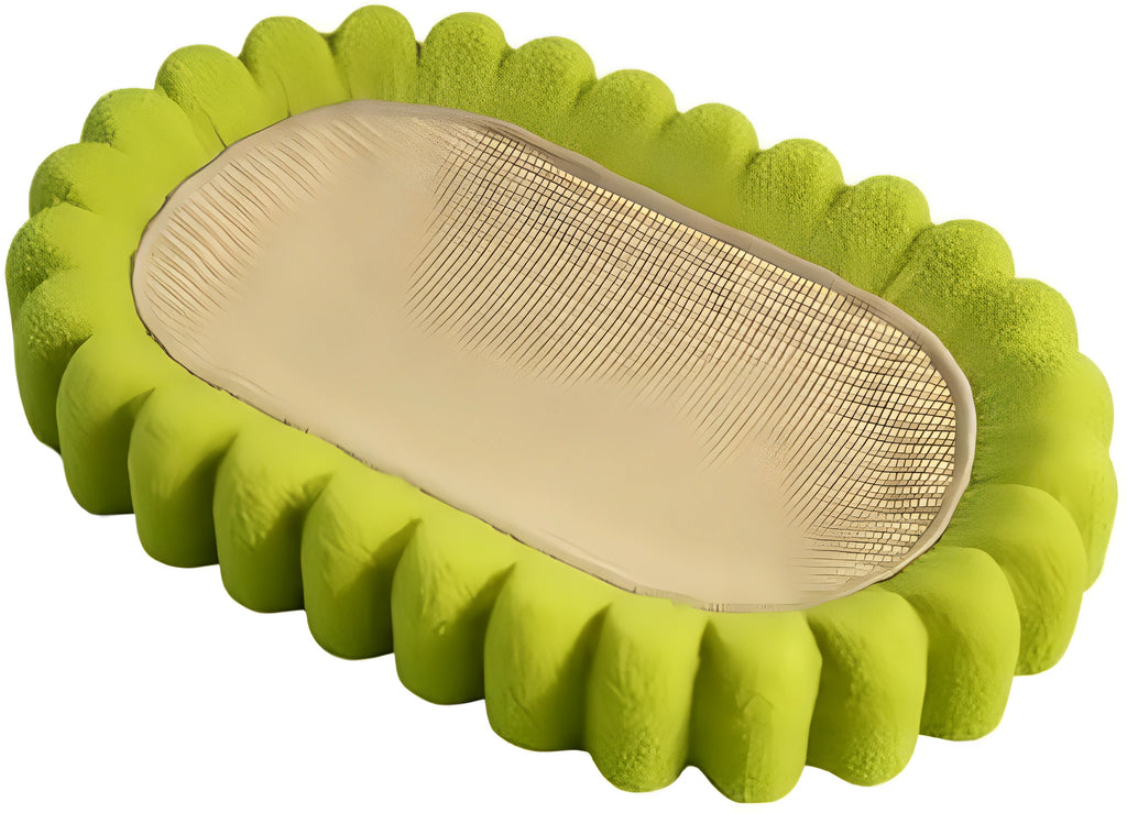 Green oval-shaped cat scratching pad serving as a bed with a sisal surface
