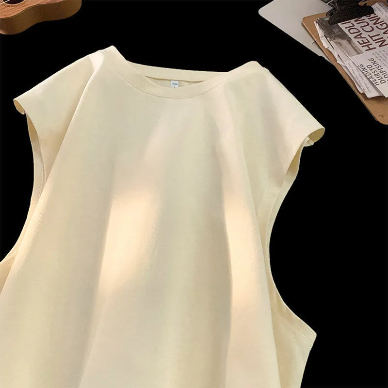 Men's loose fit solid colour cotton tank top on a hanger