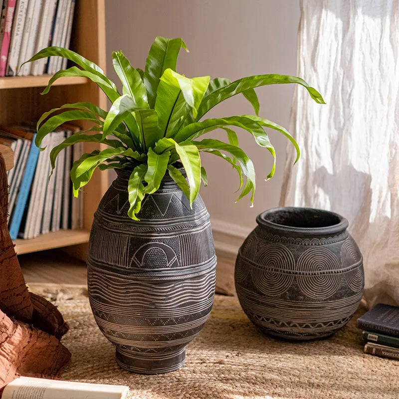 African art cement flower pot with textured finish and drainage holes for indoor outdoor plants