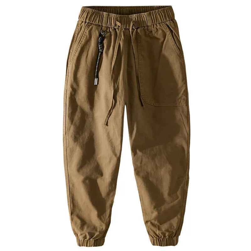 Men's army green cotton overalls with drawstring waist and ankle banded cuffs laid flat