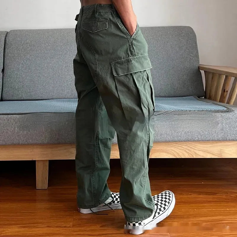 Men's army green washed cotton paratrooper trousers with large pockets, mid waist and zipper fly, sizes S to XXL
