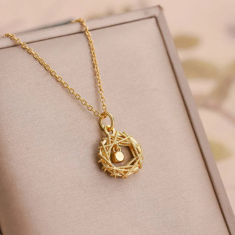 Gold circle net design necklace on a woman, titanium steel geometric pendant with O-chain style