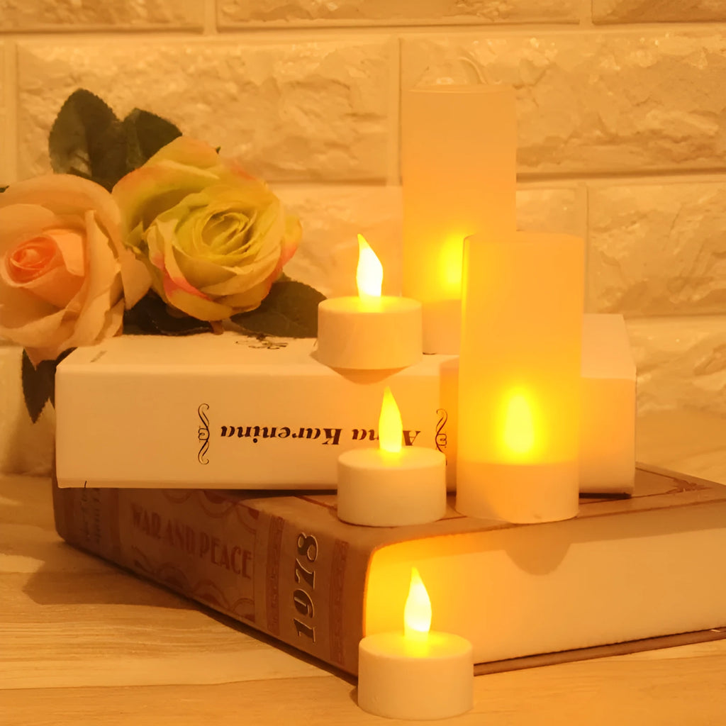 White plastic USB rechargeable LED candle lamp with flame-shaped head on plastic cup