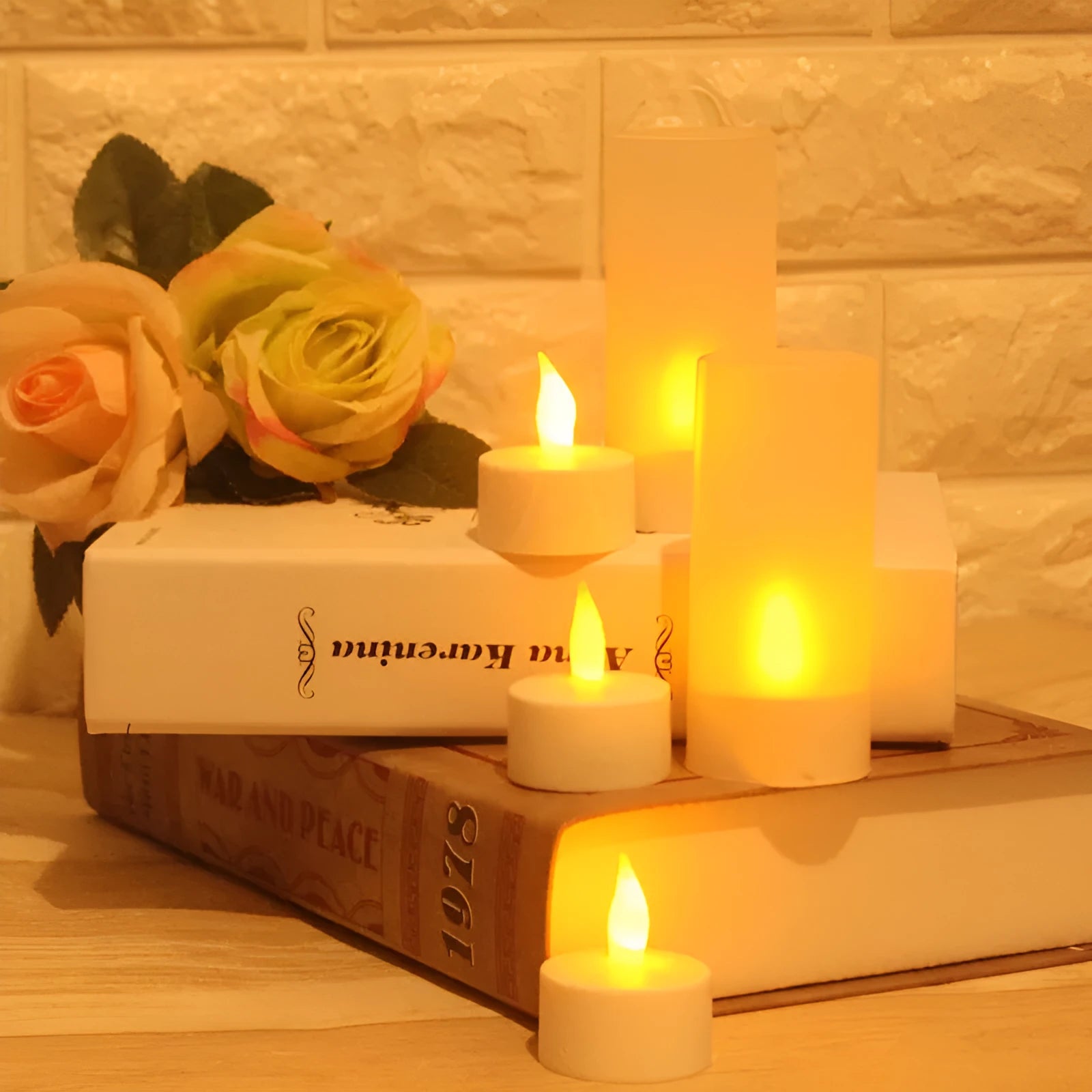 White plastic USB rechargeable LED candle lamp with flame-shaped head on plastic cup