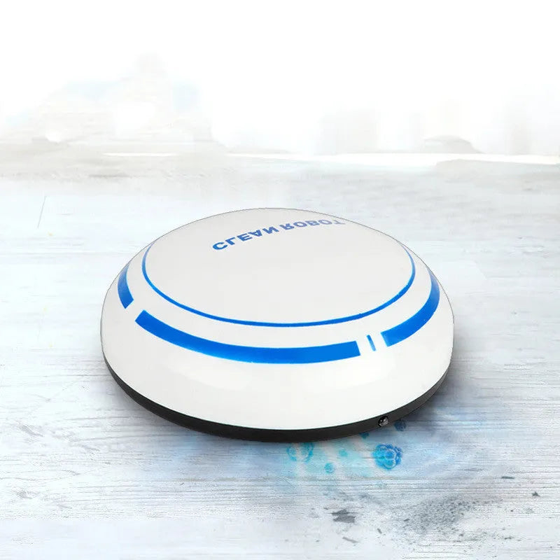 Mini desktop robot vacuum cleaner in white or black with dry dust box, flat nozzle and 4 metre power cord.
