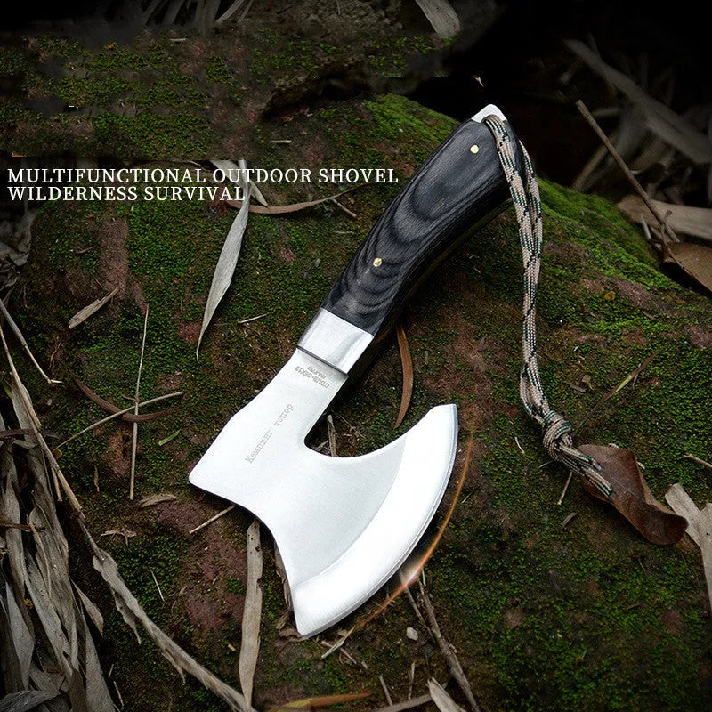 Outdoor Tactics stainless steel axe on ground, 57cm length, 49HRC hardness for wood chopping