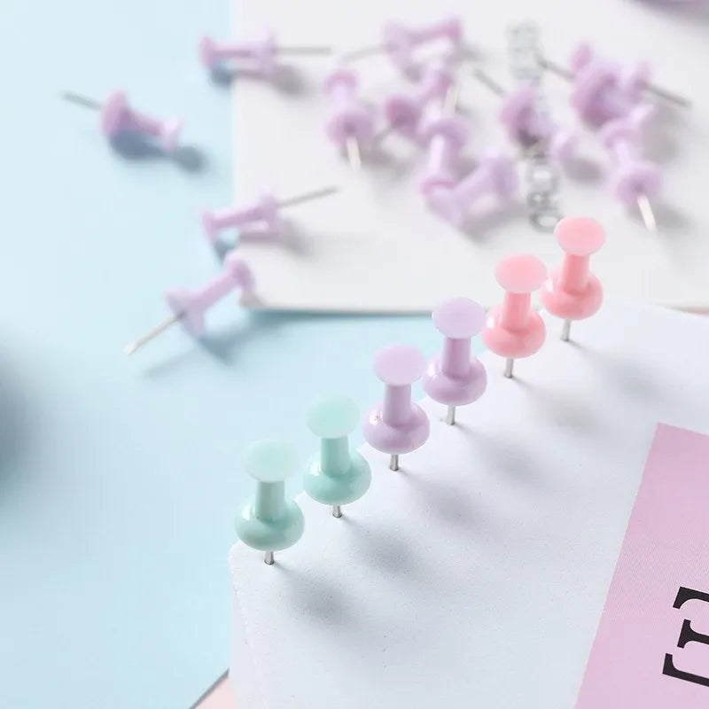 Macaron colour plastic push pins in large and small sizes including cherry blossom pink, mint green and lavender options