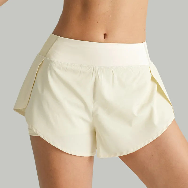 2-in-1 active shorts in Light Blue, polyester fibre, size M, flat lay view showing outer short and built-in liner