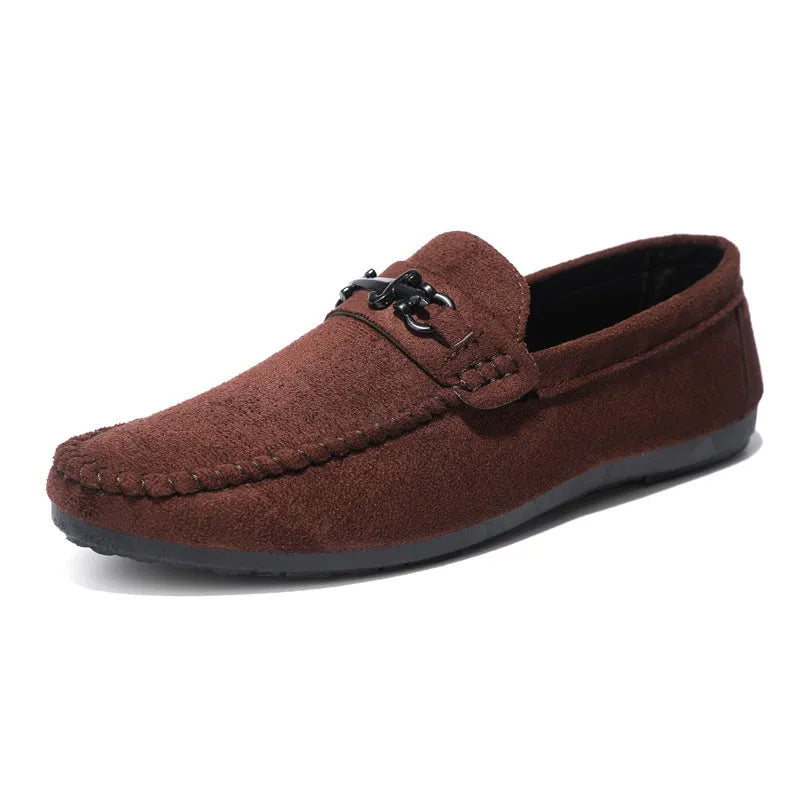 Men's black slip-on loafers with round toe and low stiletto heel, showing sewing thread detailing on artificial PU leather upper