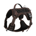 Orange reflective dog vest harness with a black detachable hand-holding rope laid flat.