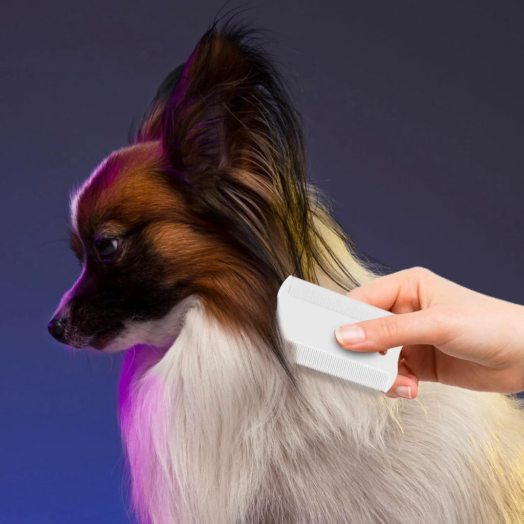 Double-sided plastic flea comb for pets with dense teeth and compact 0.85 x 5 cm dimensions