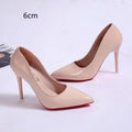 Women's black pointed toe stiletto pumps with a shallow mouth design on a white background.